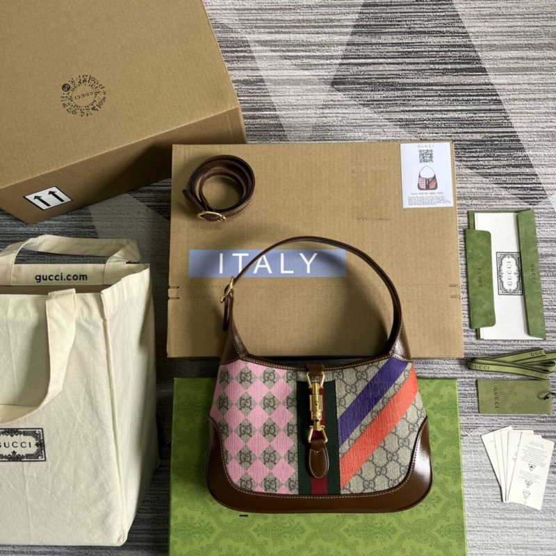G*u*i top handle bags